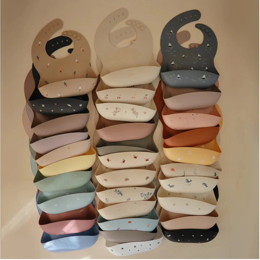 Mushie Silicone Baby Bib - Rainbows - Image 6