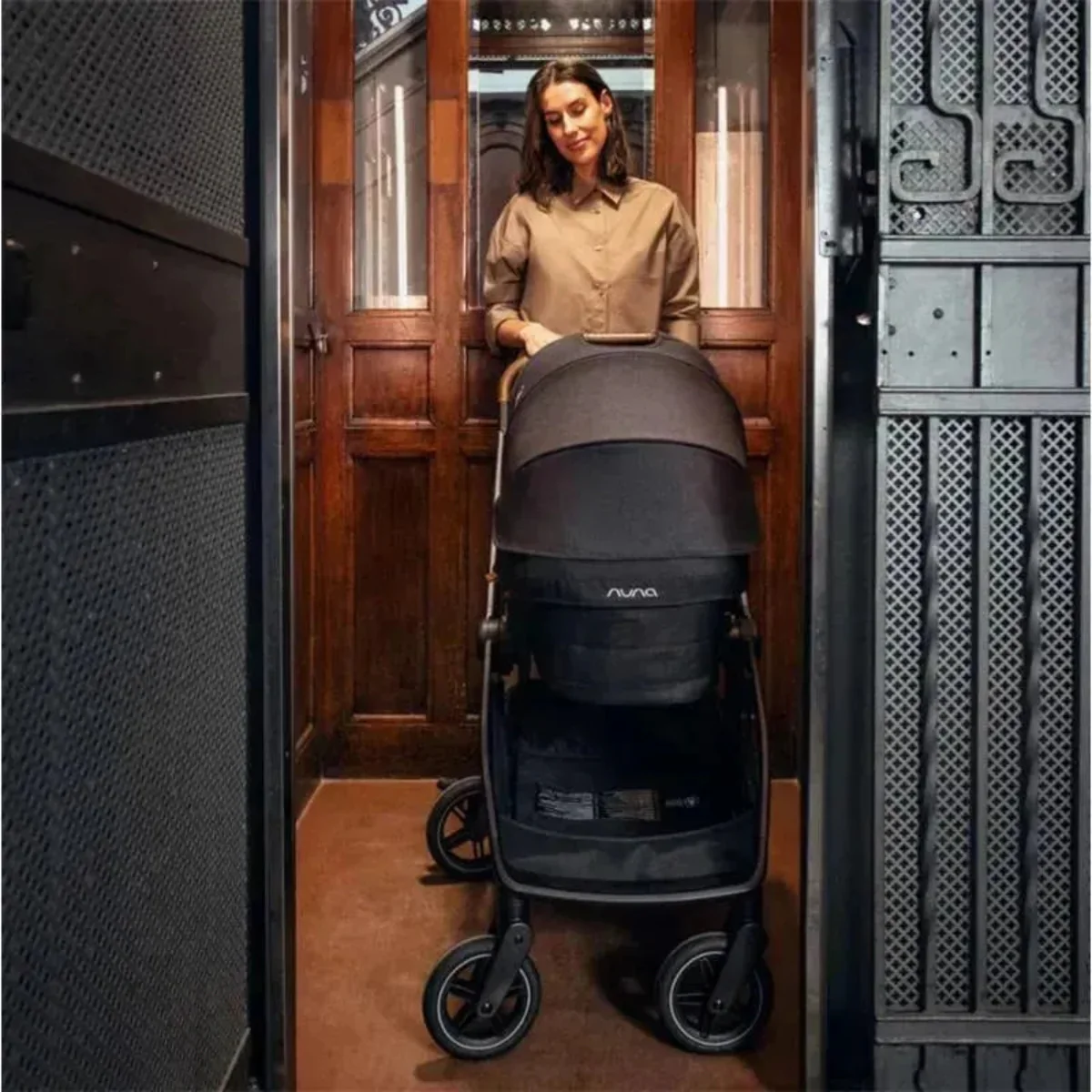 Nuna Swiv Stroller - Caviar - Image 9
